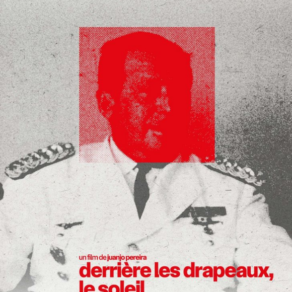 Derrière les drapeaux, le soleil